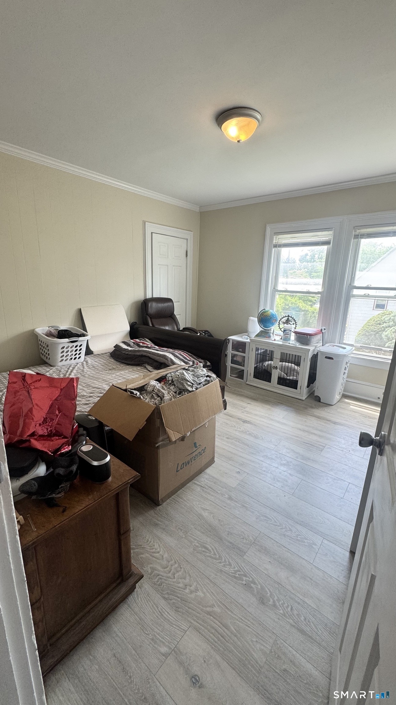 104 Prospect Street Ansonia, CT 06401 - Photo 35 of 40 a bedroom with furniture and a window