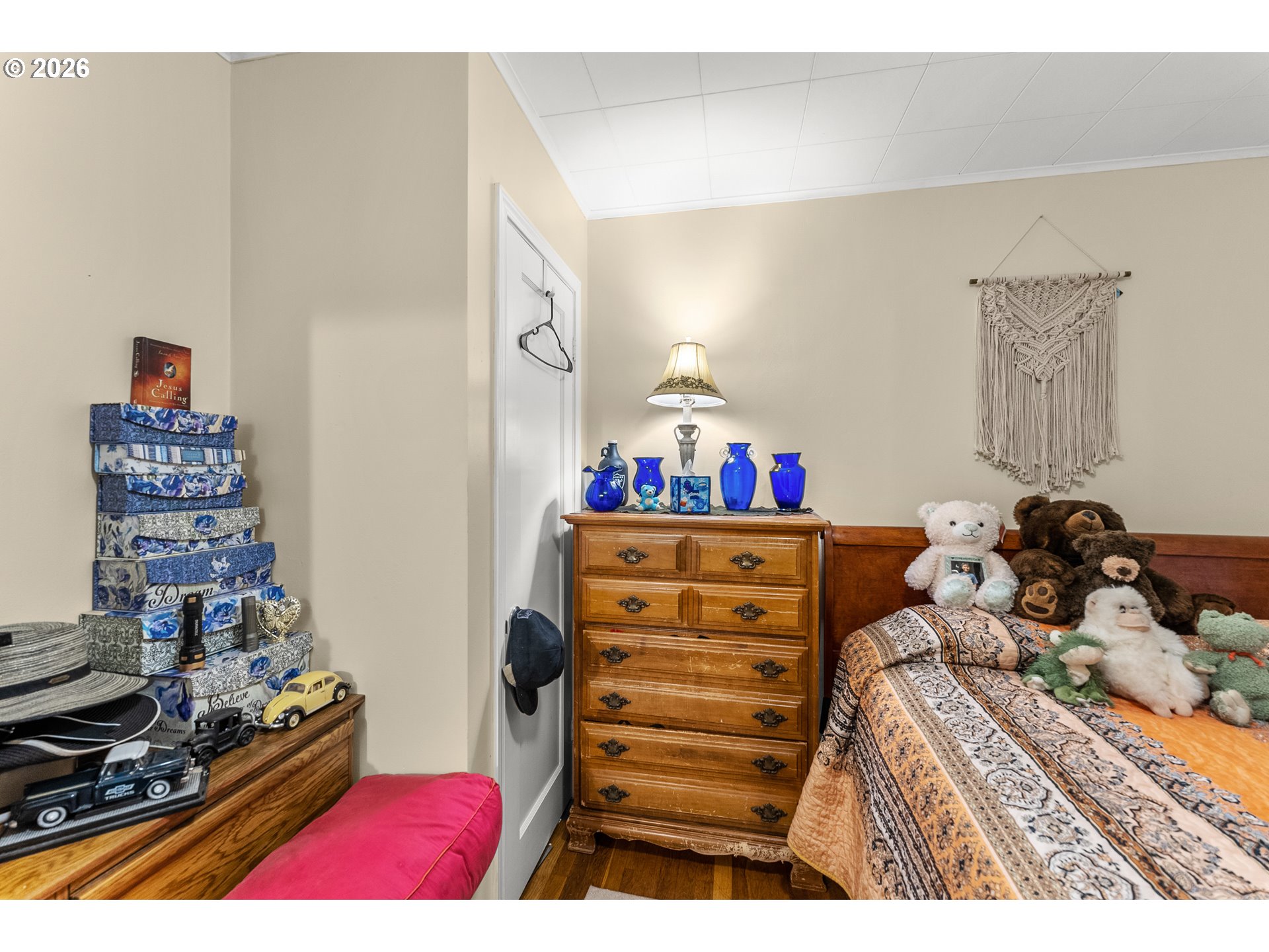 1565 Northeast Todd Street Roseburg, OR 97470 - Photo 16 of 25 a bedroom with a bed and a dresser