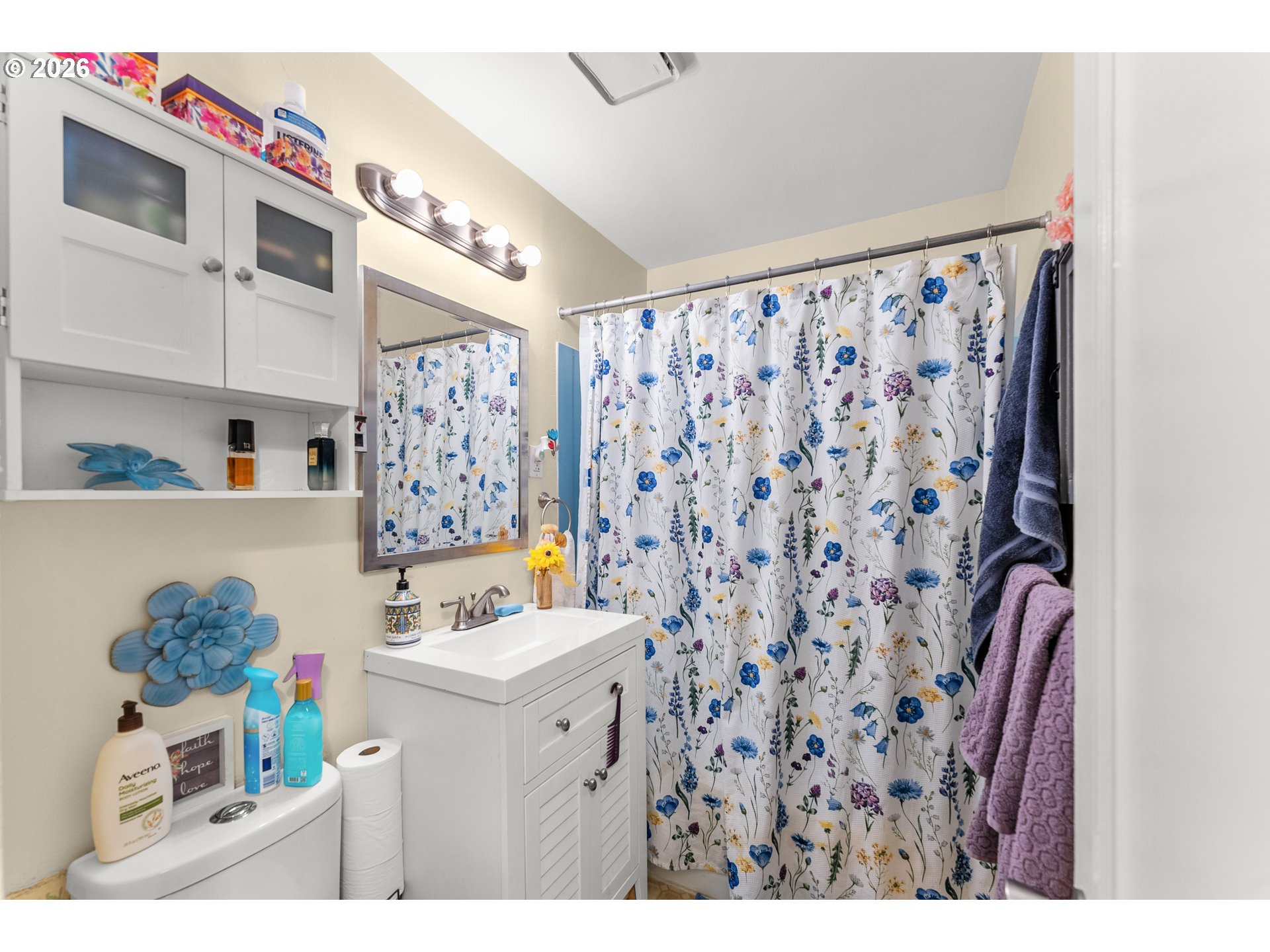 1565 Northeast Todd Street Roseburg, OR 97470 - Photo 17 of 25 a bathroom with a sink toilet and shower