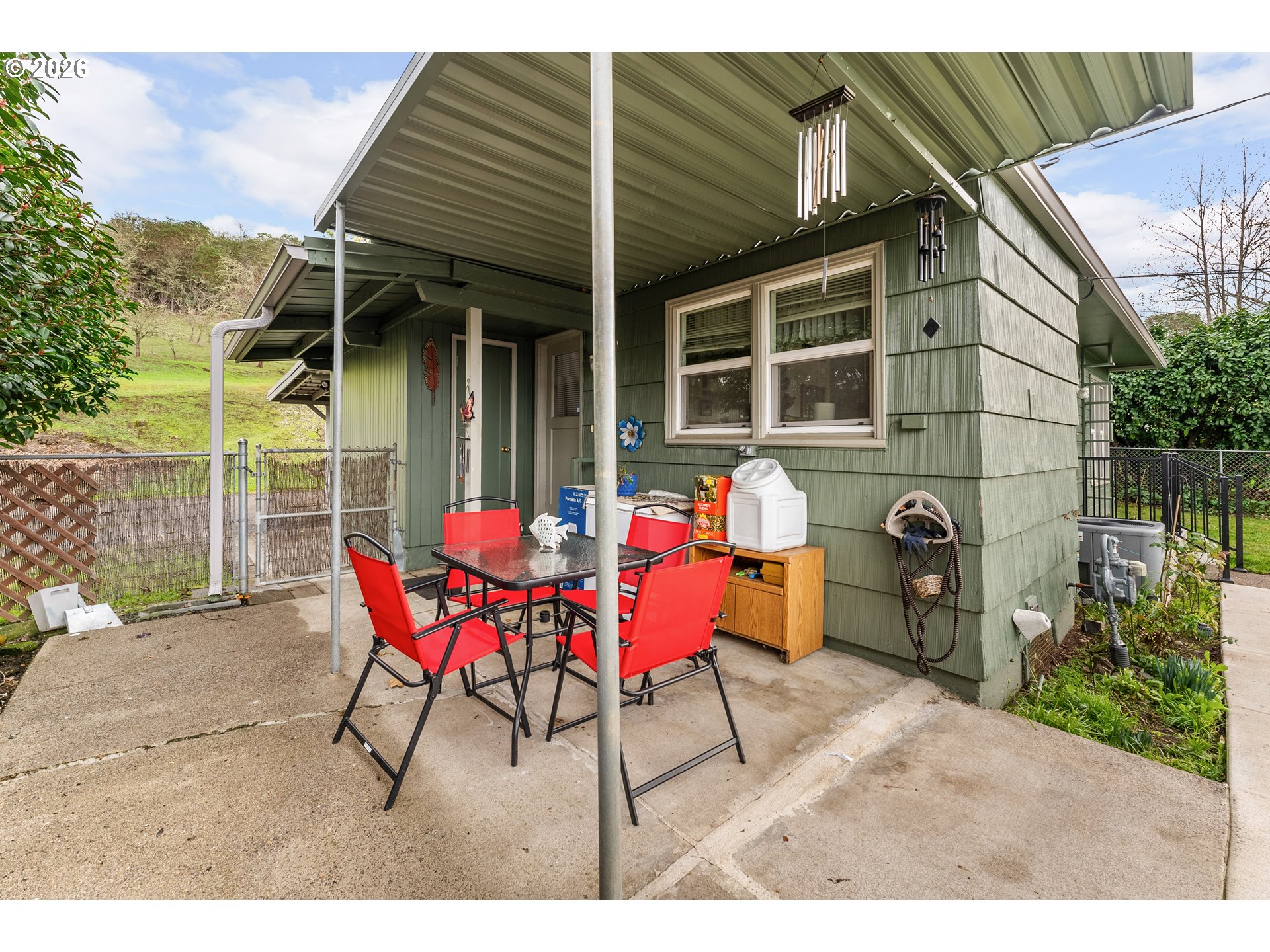 1565 Northeast Todd Street Roseburg, OR 97470 - Photo 20 of 25 a view of a chairs and table in the backyard