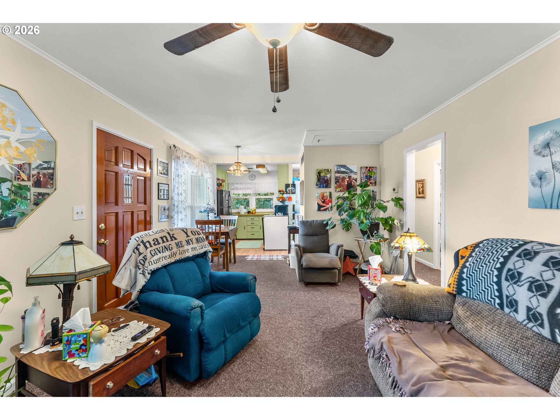 1565 Northeast Todd Street Roseburg, OR 97470 - Photo 5 of 25 a living room with furniture and a potted plant