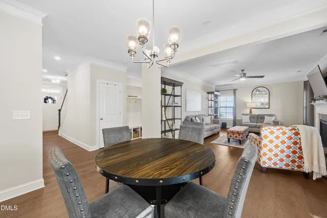 a spacious bathroom with a granite countertop sink mirror and a bathtub
