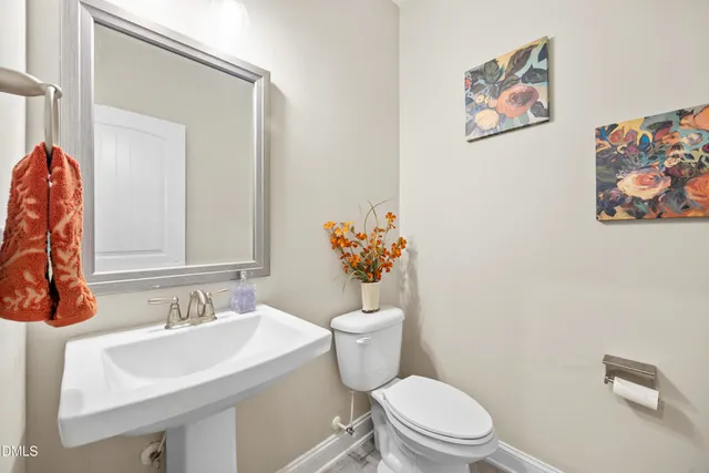 a view of living room with furniture and a floor to ceiling window