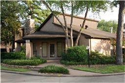 12755 Mill Ridge Drive, Unit 501 Cypress, TX 77429 - Photo 16 of 20 a view of a house with brick walls and a tree