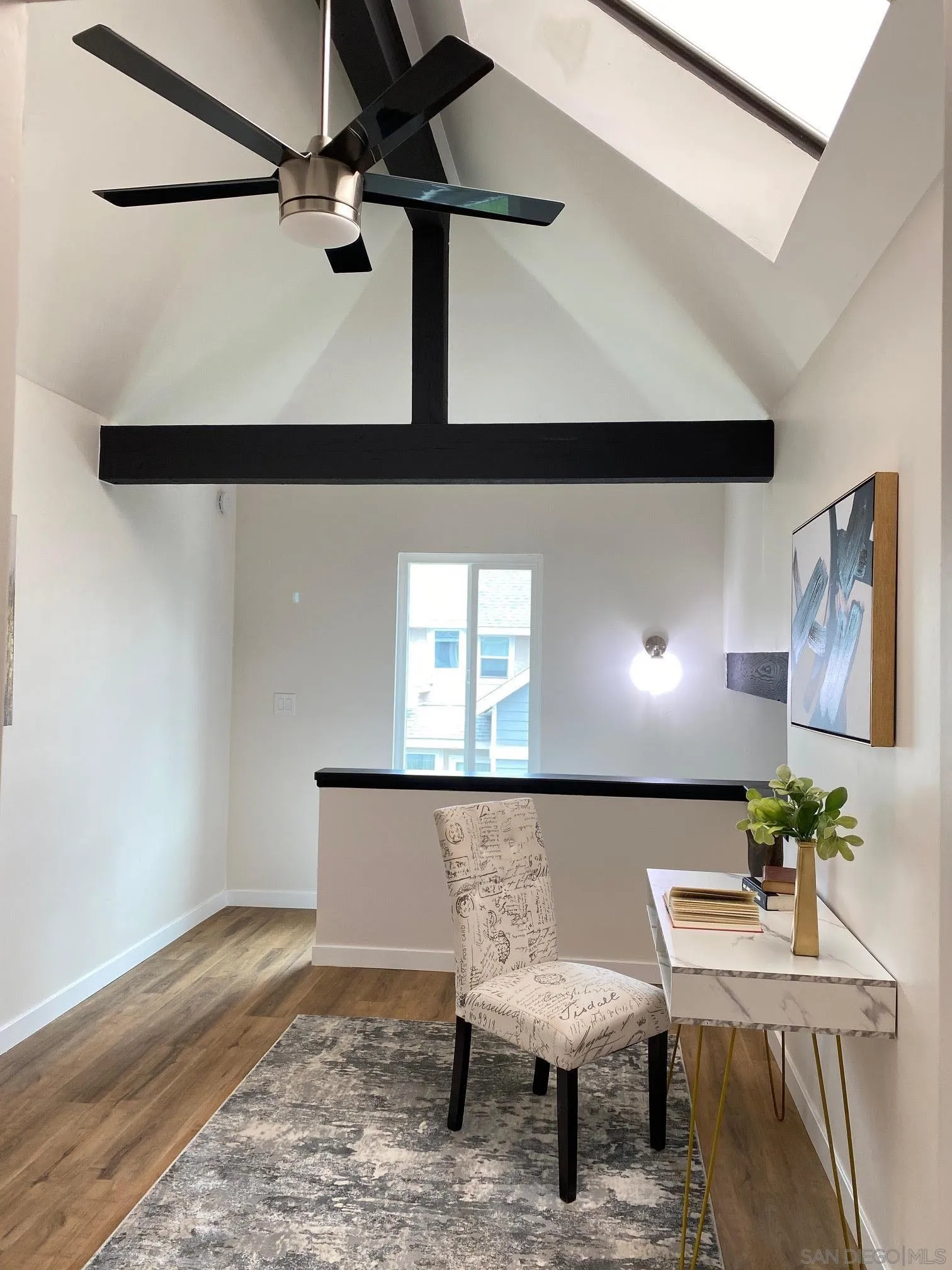 13221 Westmark Way, Unit 26 Poway, CA 92064 - Photo 15 of 42 a living room with a couch and a potted plant