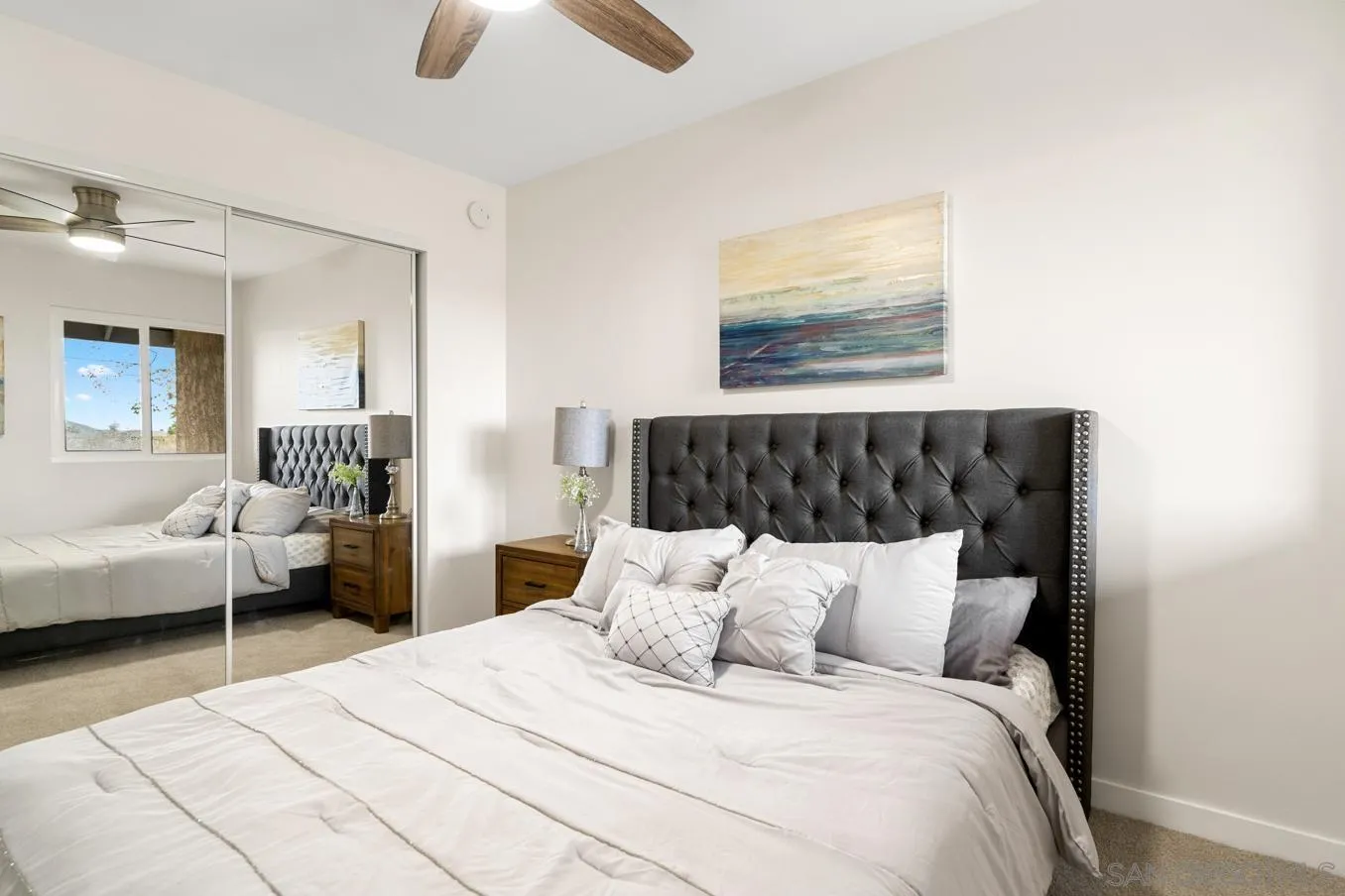 13221 Westmark Way, Unit 26 Poway, CA 92064 - Photo 21 of 42 a bedroom with bed and a couch