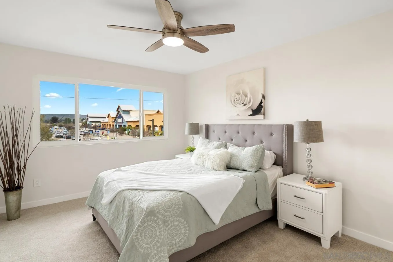 13221 Westmark Way, Unit 26 Poway, CA 92064 - Photo 24 of 42 a bedroom with a bed and ceiling fan