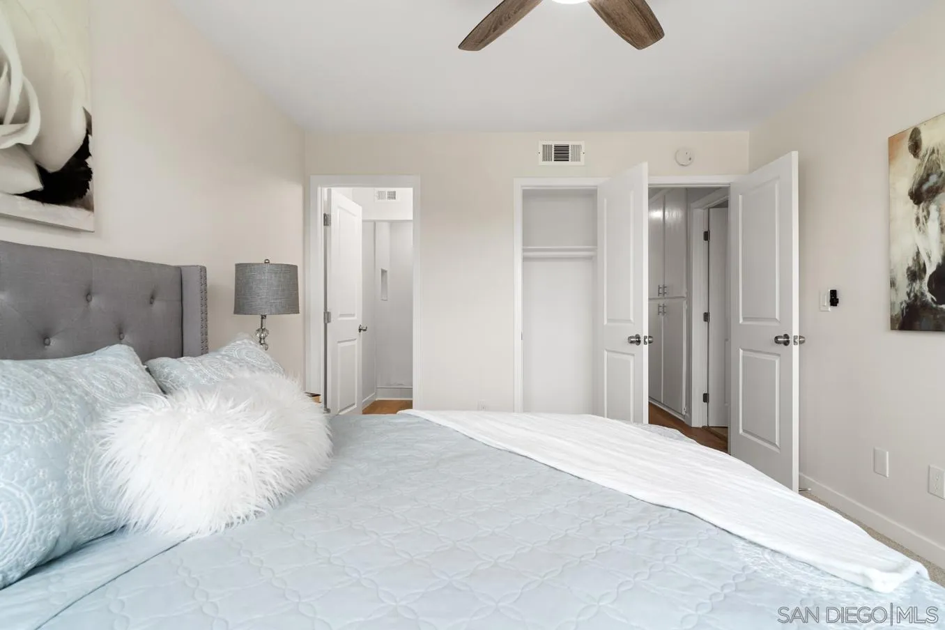 13221 Westmark Way, Unit 26 Poway, CA 92064 - Photo 25 of 42 a large white bed in a white room