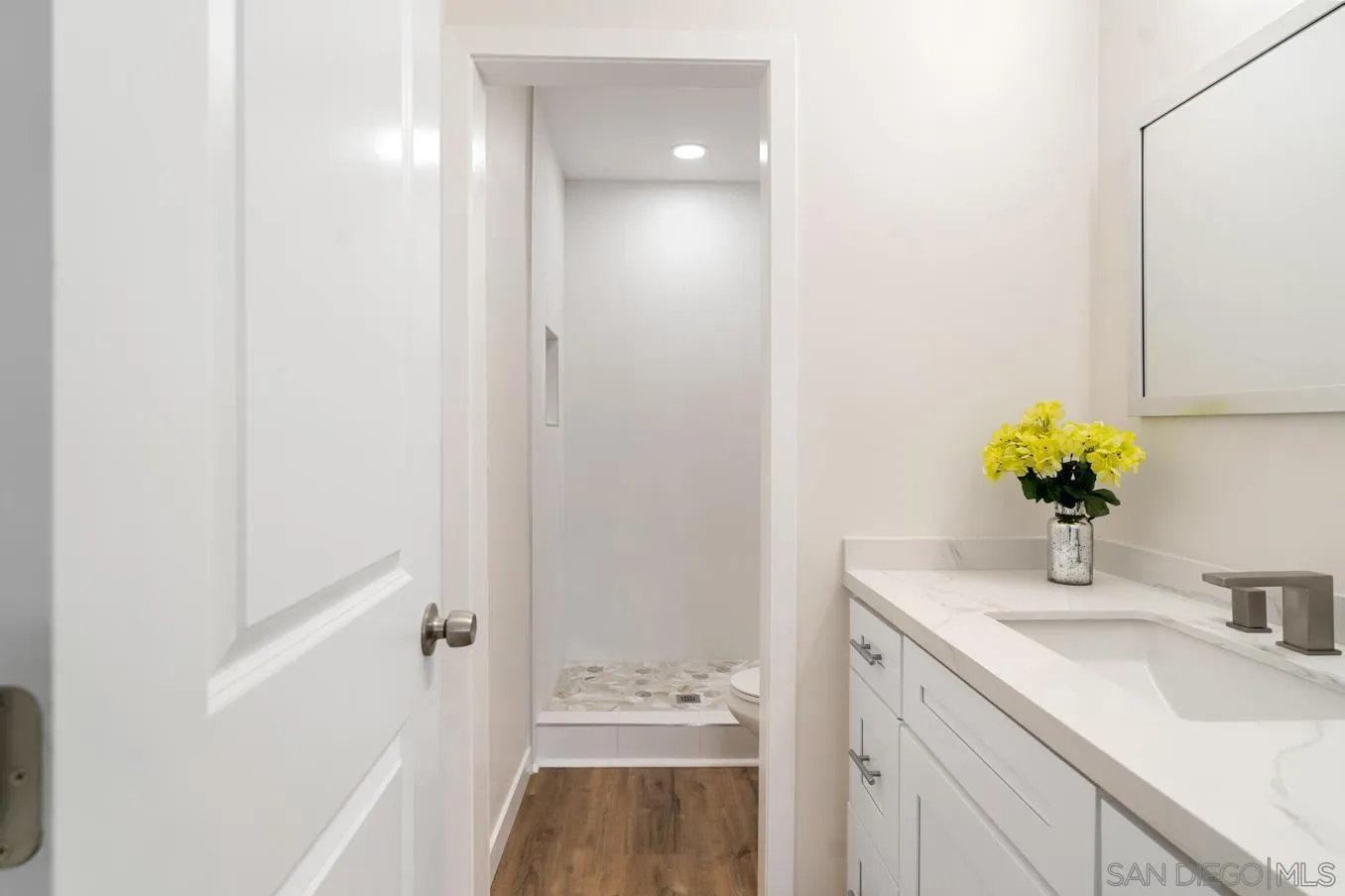 13221 Westmark Way, Unit 26 Poway, CA 92064 - Photo 27 of 42 a bathroom with a sink and a mirror