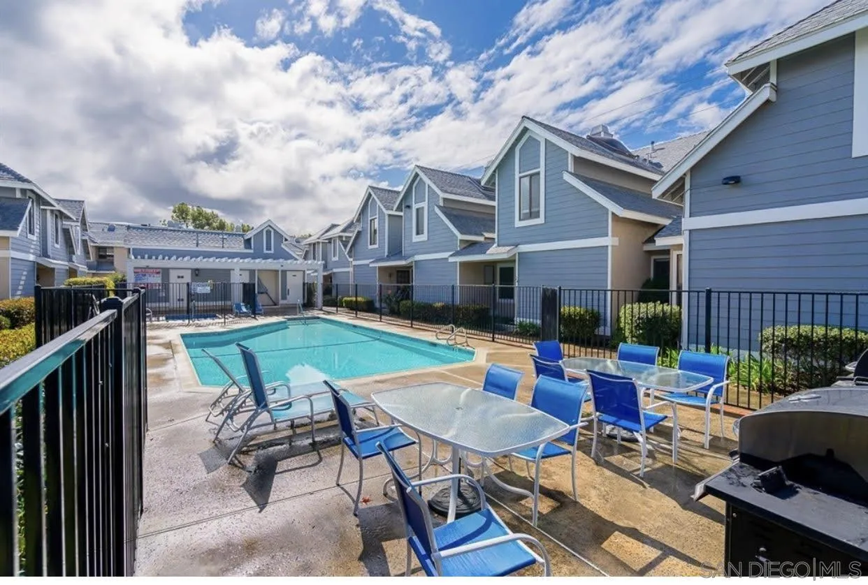 13221 Westmark Way, Unit 26 Poway, CA 92064 - Photo 35 of 42 a view of backyard with seating space and wooden fence