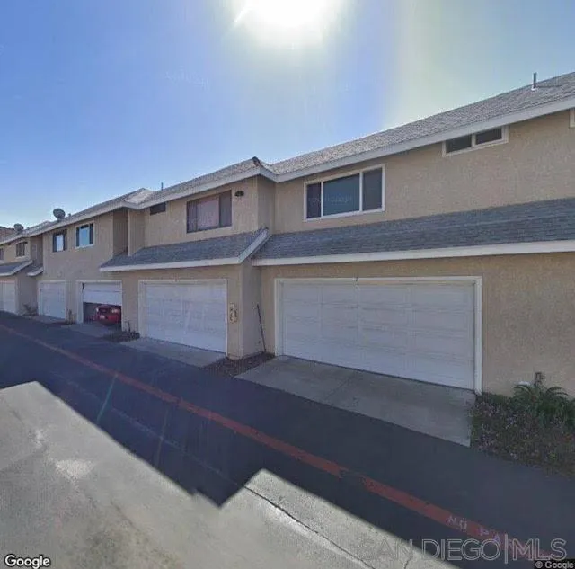 13221 Westmark Way, Unit 26 Poway, CA 92064 - Photo 39 of 42 a front view of a house with yard