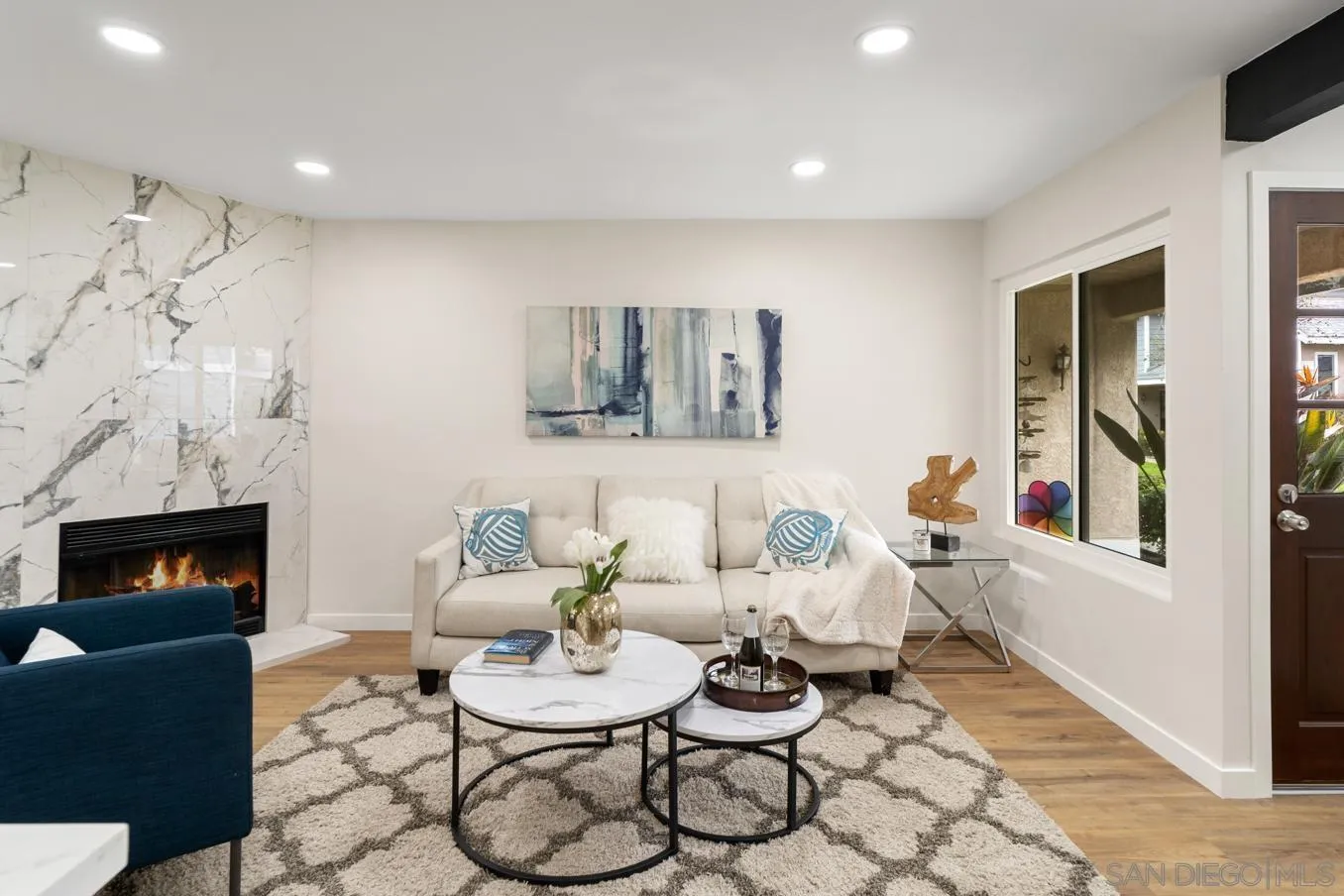 13221 Westmark Way, Unit 26 Poway, CA 92064 - Photo 4 of 42 a living room with furniture and a fireplace