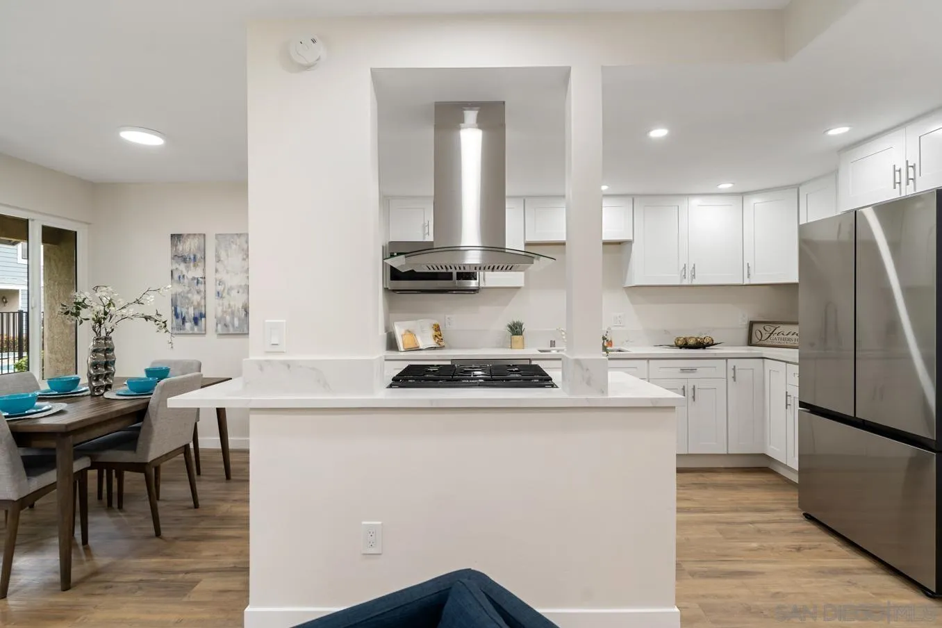 13221 Westmark Way, Unit 26 Poway, CA 92064 - Photo 8 of 42 a kitchen with a white stove top oven and refrigerator