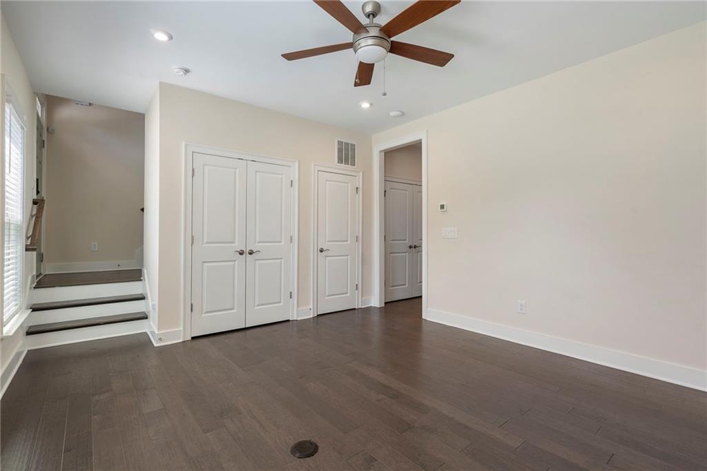 2059 Falls Park Way Decatur, GA 30033 - Photo 14 of 45 an empty room with a empty space and a ceiling fan