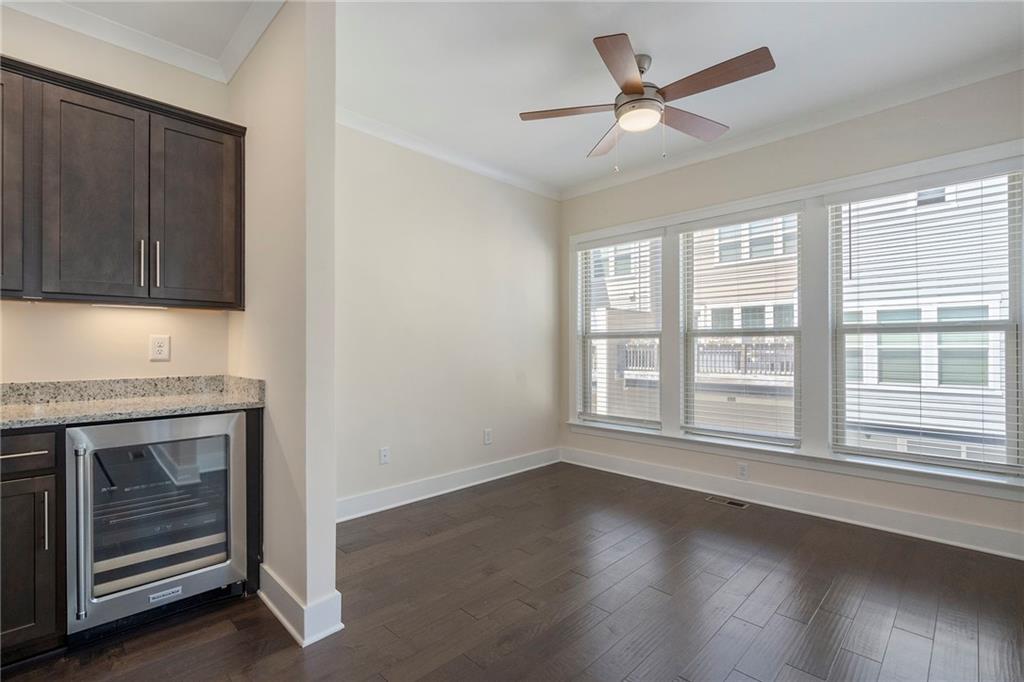 2059 Falls Park Way Decatur, GA 30033 - Photo 18 of 45 a view of wooden floor and a chandelier in a room