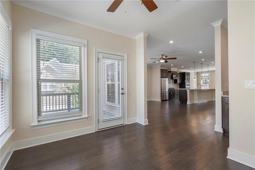2059 Falls Park Way Decatur, GA 30033 - Photo 20 of 45 a view of an empty room with kitchen and a window