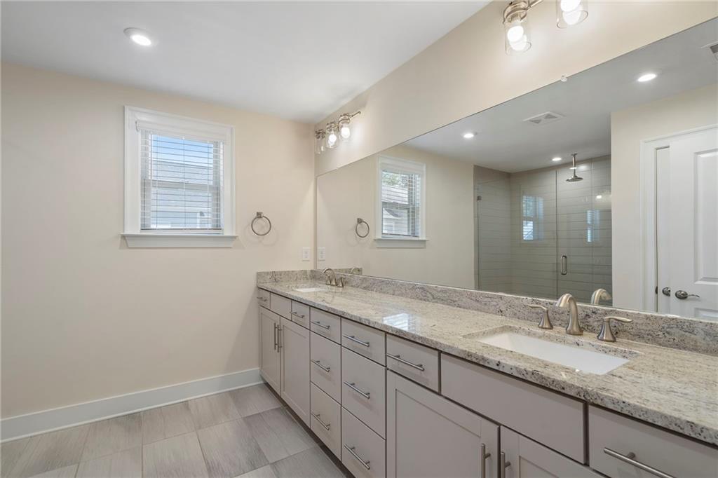2059 Falls Park Way Decatur, GA 30033 - Photo 25 of 45 a bathroom with a granite countertop sink mirror and double