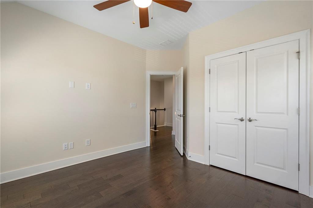 2059 Falls Park Way Decatur, GA 30033 - Photo 32 of 45 an empty room with ceiling fan and window