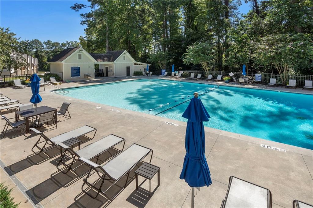 2059 Falls Park Way Decatur, GA 30033 - Photo 39 of 45 a front view of a house with a yard and trees