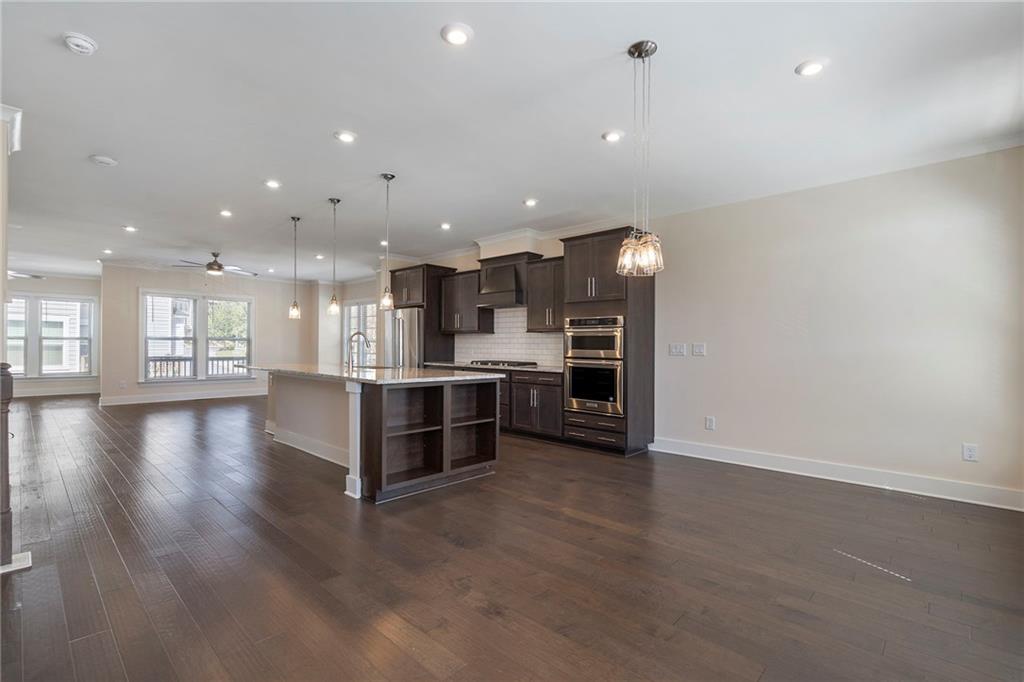 2059 Falls Park Way Decatur, GA 30033 - Photo 4 of 45 a view of large kitchen with kitchen island and stainless steel appliances