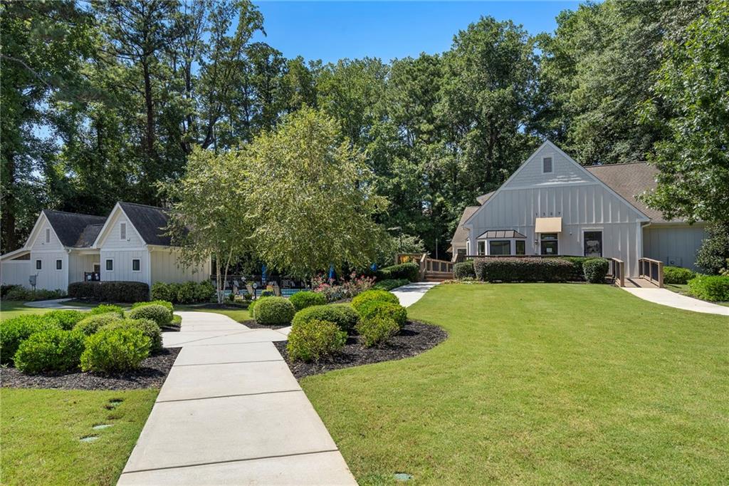2059 Falls Park Way Decatur, GA 30033 - Photo 45 of 45 a front view of a house with a yard and trees