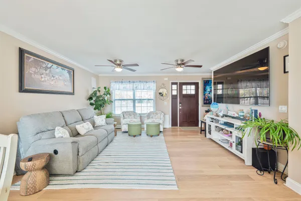 a view of walk in closet with white walls