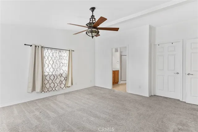 a view of empty room with windows