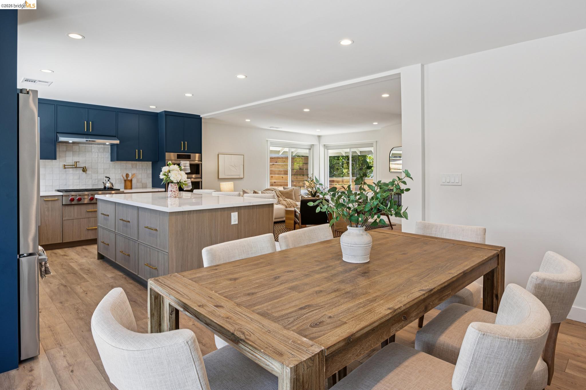 11 Belinda Court San Ramon, CA 94583 - Photo 14 of 33 Open-concept dining area featuring a wood-finish dining table