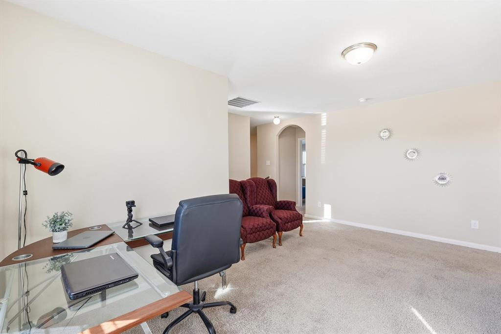 227 Curt Street Anna, TX 75409 - Photo 27 of 40 Office space featuring arched walkways and light colored carpet