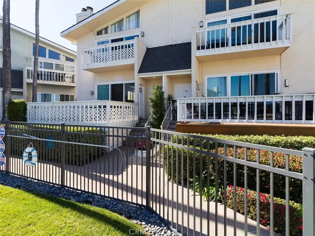 a view of a brick building with many windows
