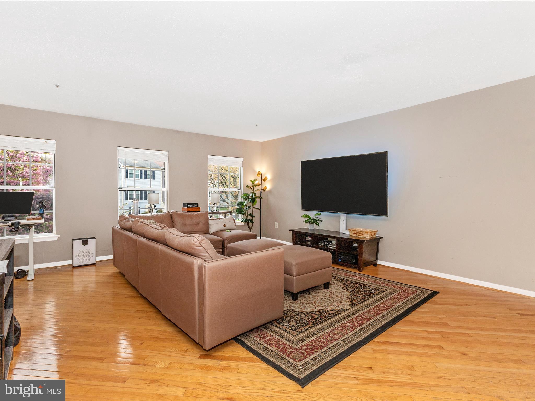 2544 Ambling Circle, Unit 31 Crofton, MD 21114 - Photo 15 of 52 a living room with furniture and a flat screen tv