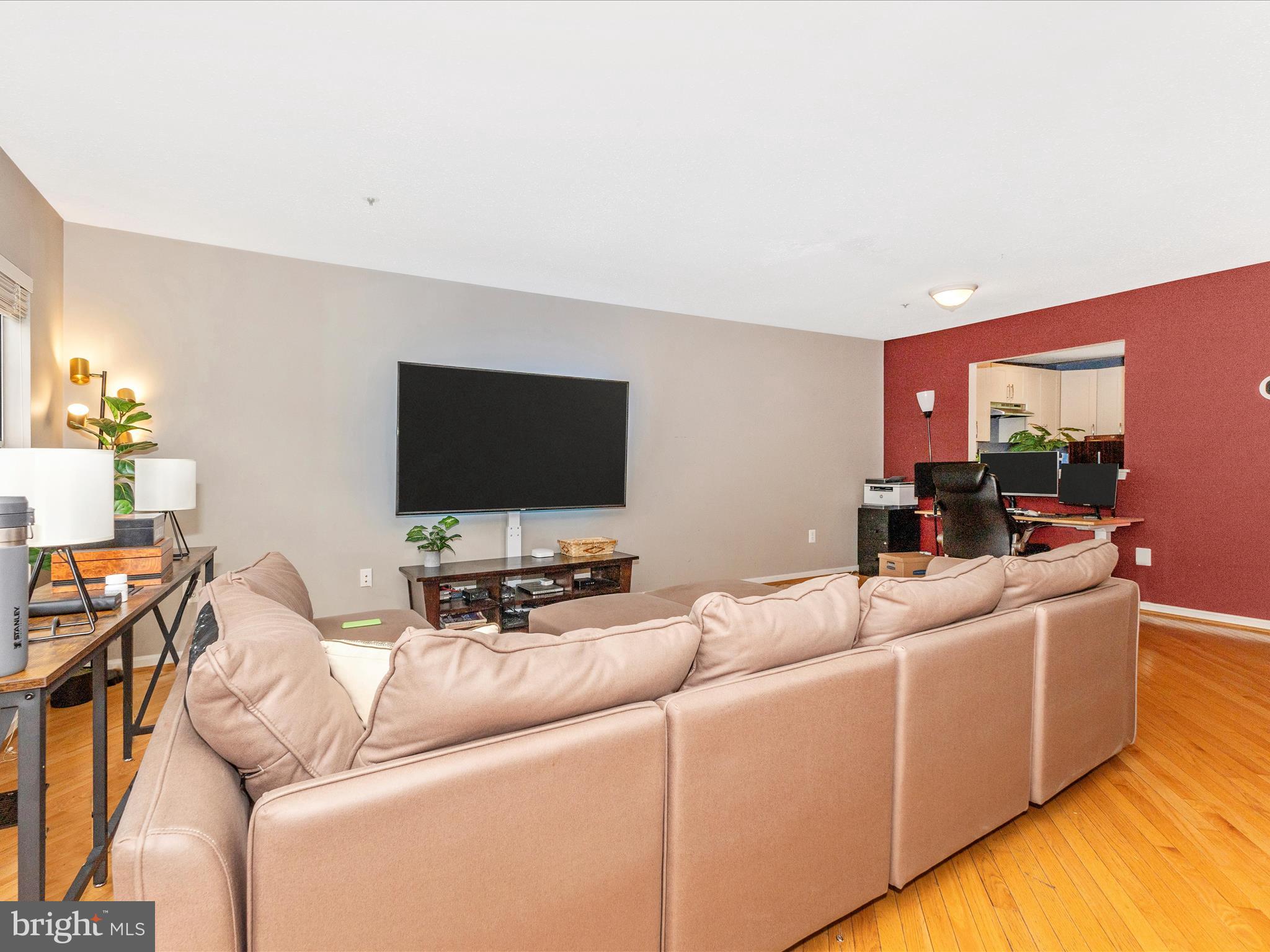2544 Ambling Circle, Unit 31 Crofton, MD 21114 - Photo 17 of 52 a living room with furniture and a flat screen tv