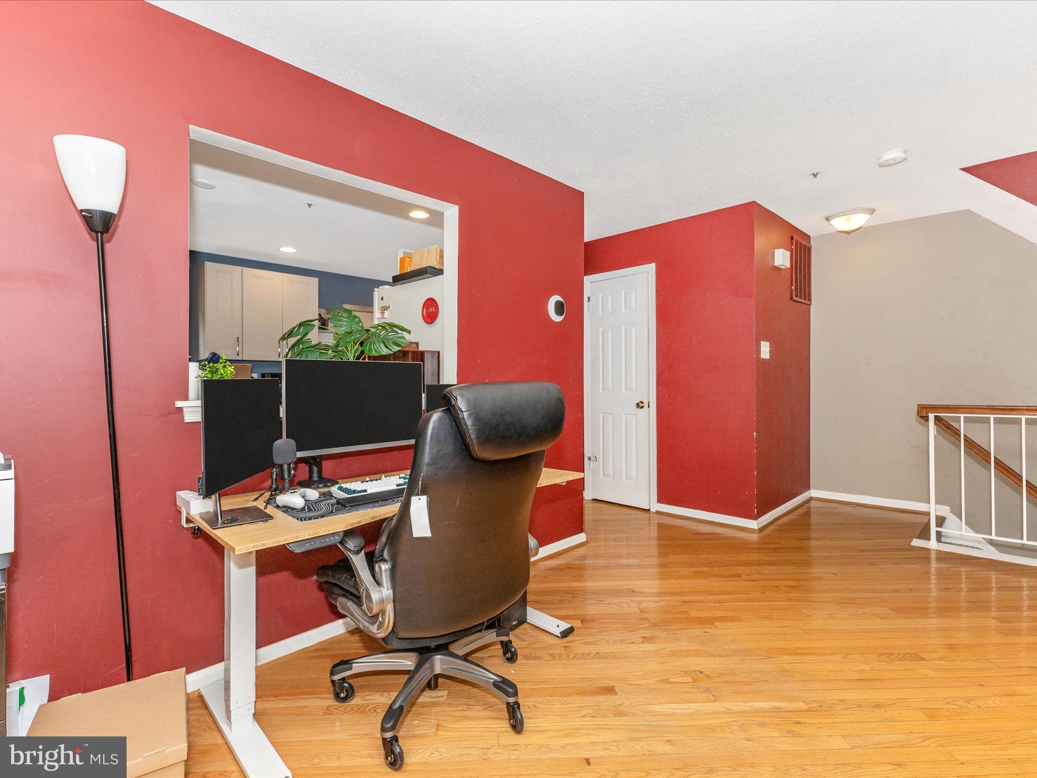 2544 Ambling Circle, Unit 31 Crofton, MD 21114 - Photo 19 of 52 a workspace with furniture and wooden floor