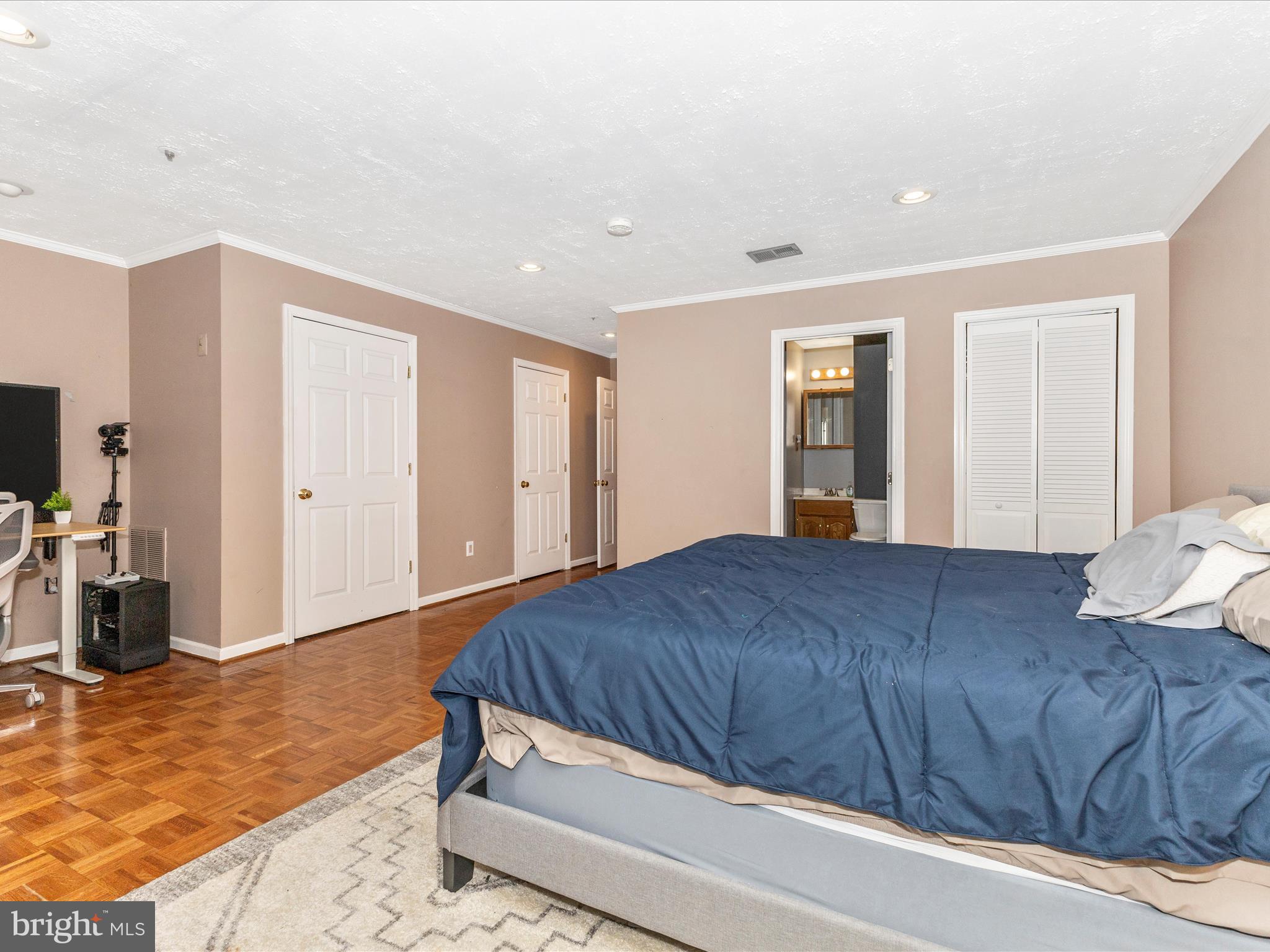 2544 Ambling Circle, Unit 31 Crofton, MD 21114 - Photo 24 of 52 a bedroom with a bed and a flat screen tv