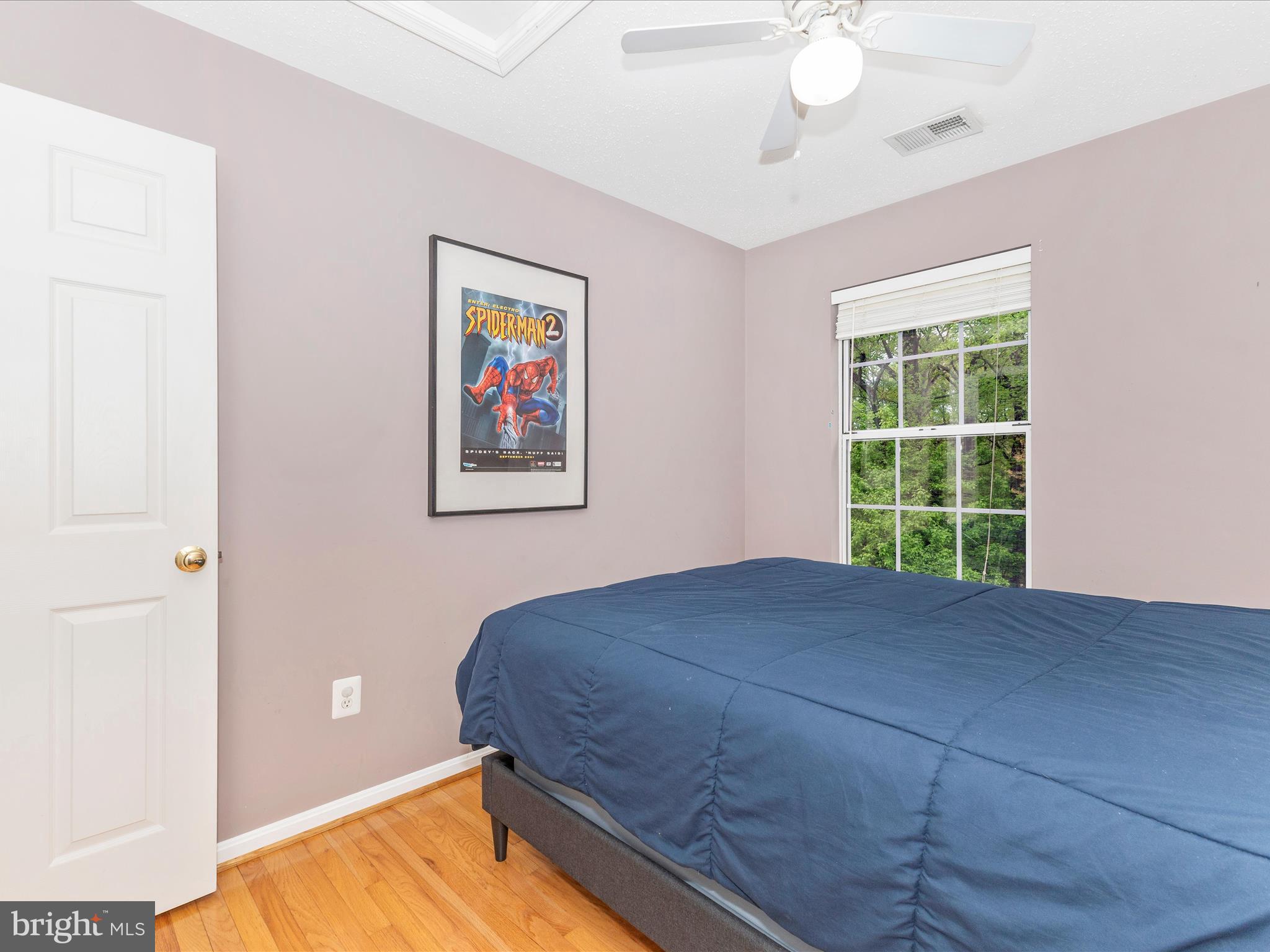 2544 Ambling Circle, Unit 31 Crofton, MD 21114 - Photo 33 of 52 a bedroom with a bed and a window