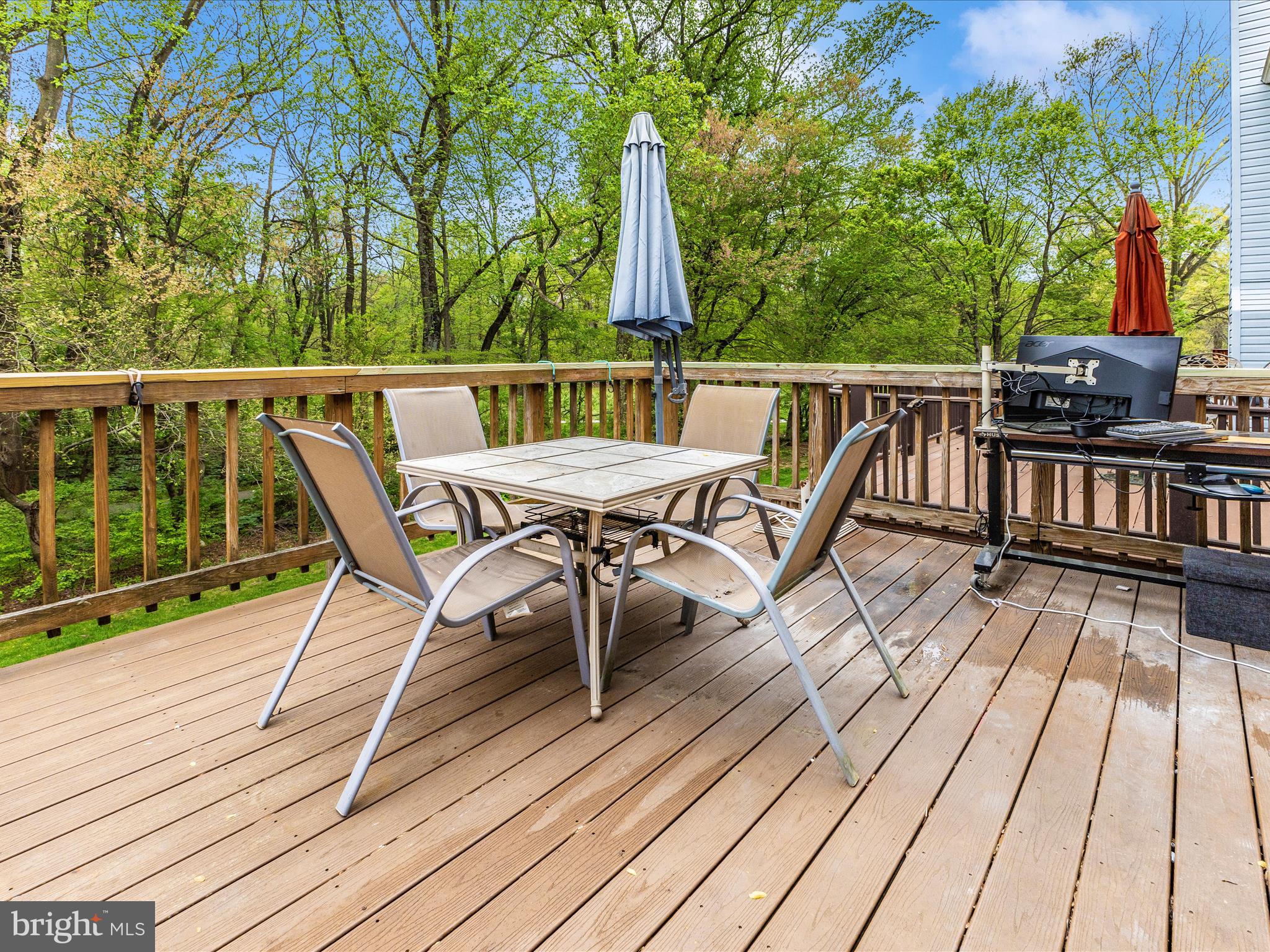 2544 Ambling Circle, Unit 31 Crofton, MD 21114 - Photo 38 of 52 a view of a deck with furniture and wooden floor