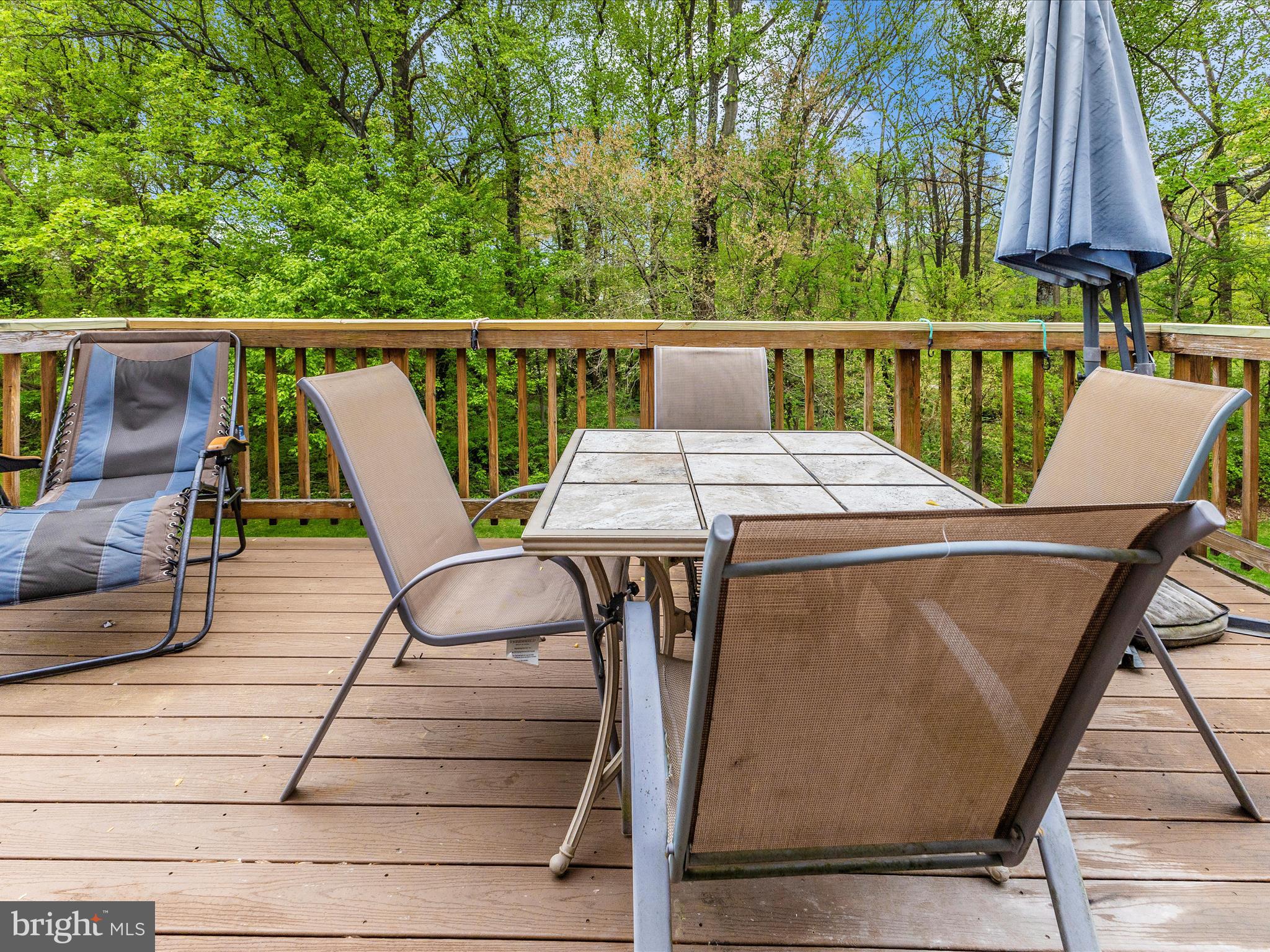 2544 Ambling Circle, Unit 31 Crofton, MD 21114 - Photo 39 of 52 a view of a patio with a table chairs and a barbeque