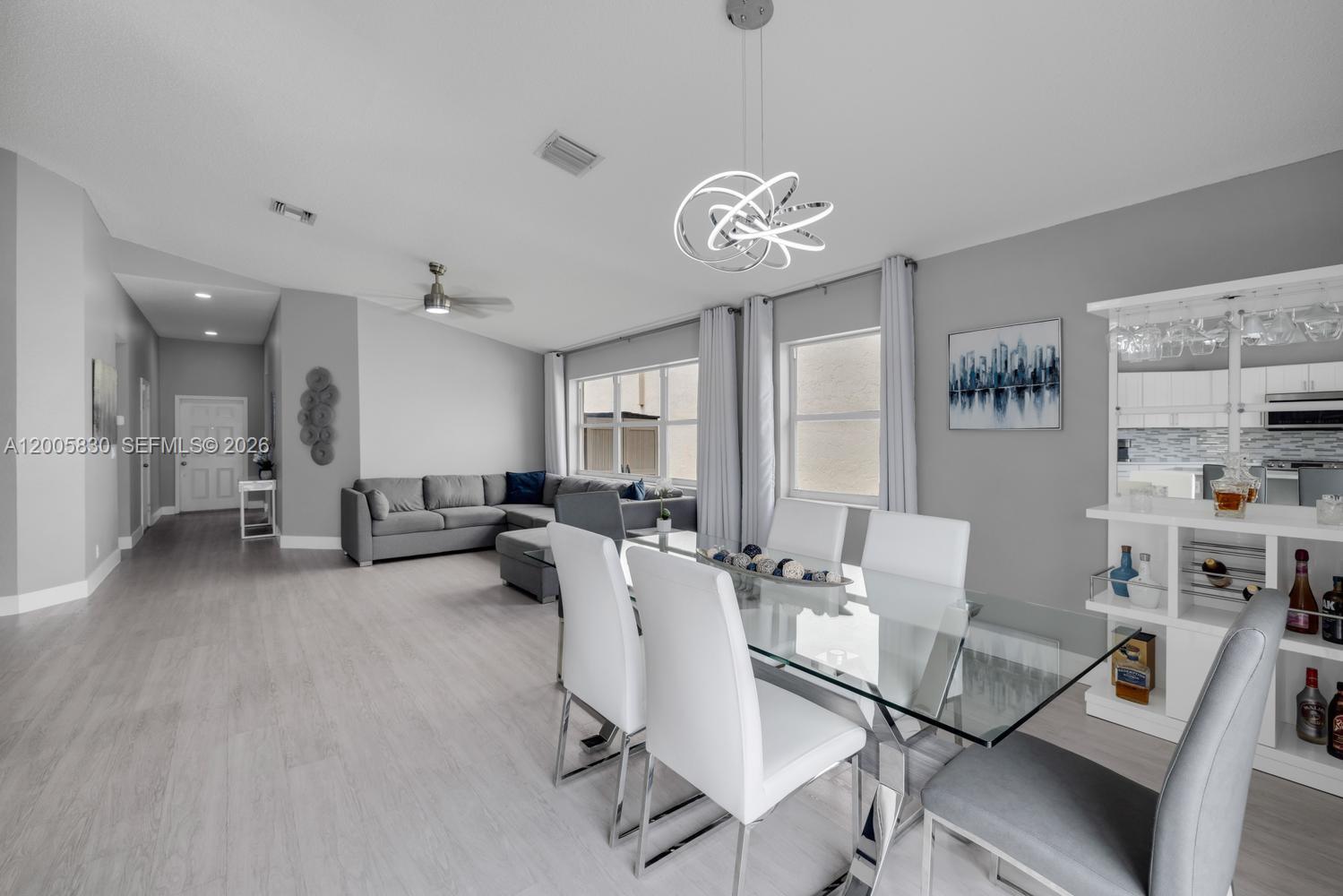 5861 South Sable Circle Margate, FL 33063 - Photo 13 of 56 a view of a dining room with furniture