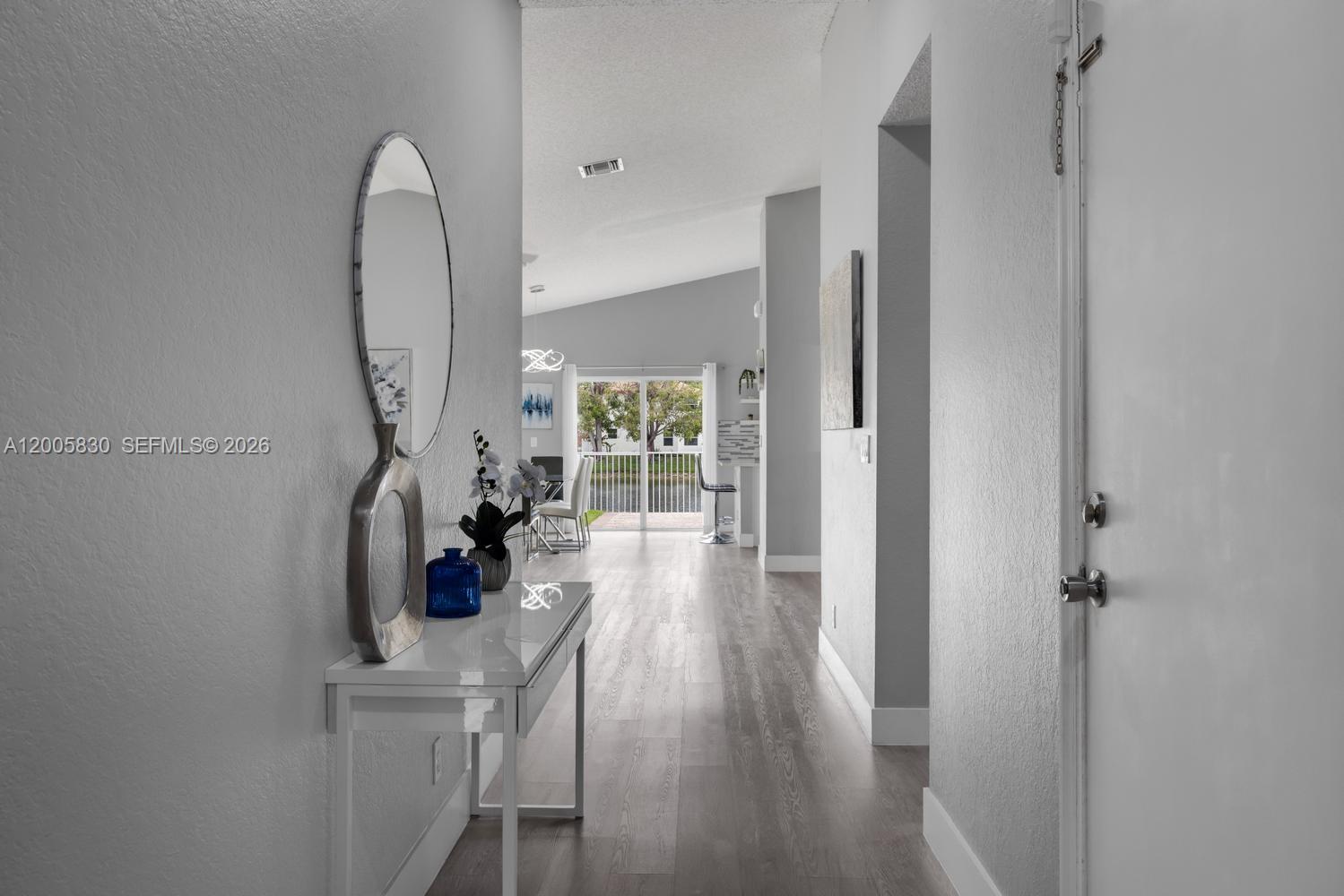 5861 South Sable Circle Margate, FL 33063 - Photo 26 of 56 a view of a livingroom with furniture and hardwood floor