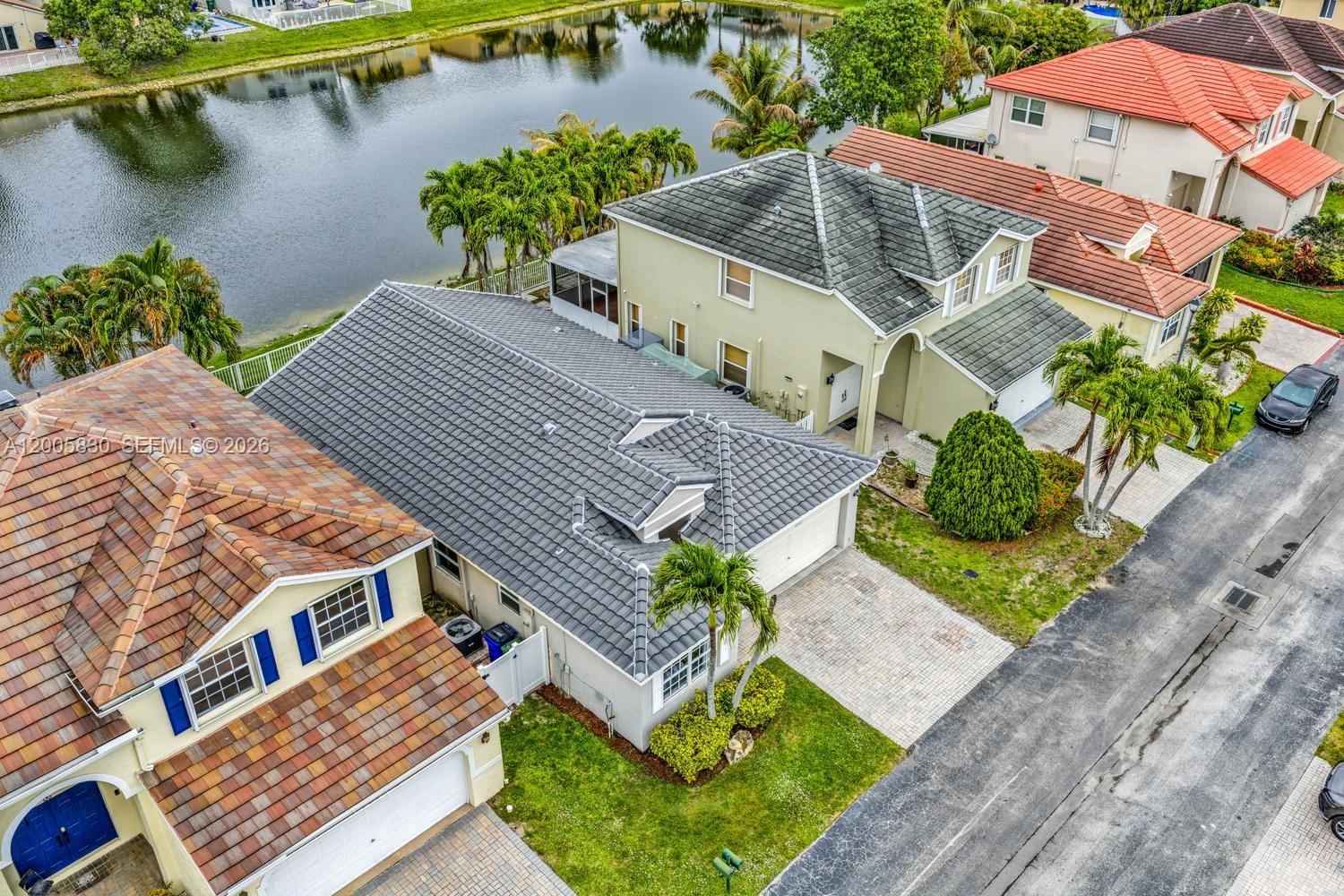 5861 South Sable Circle Margate, FL 33063 - Photo 32 of 56 an aerial view of a house with balcony and garden