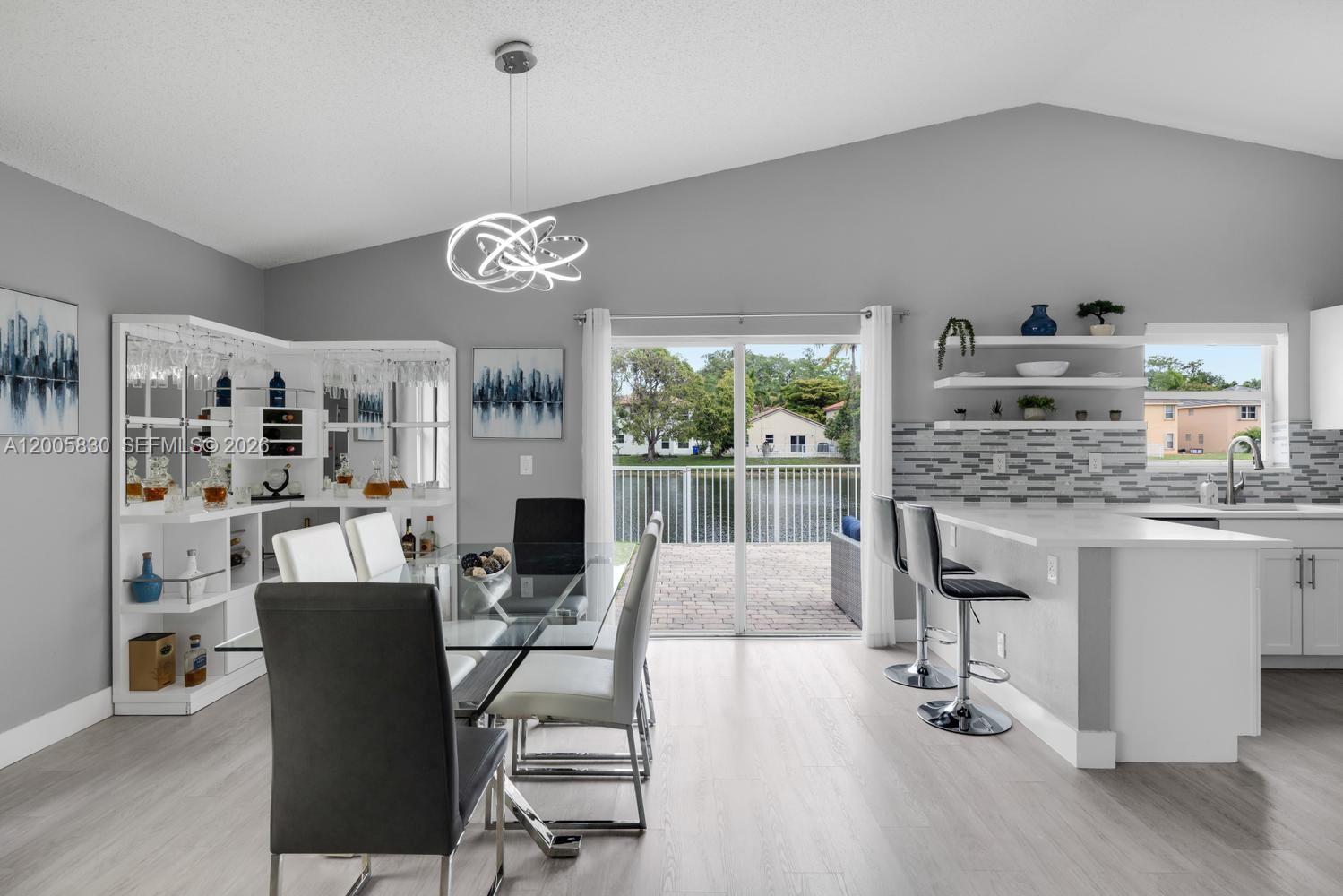 5861 South Sable Circle Margate, FL 33063 - Photo 5 of 56 a view of a dining room with furniture window and outside view
