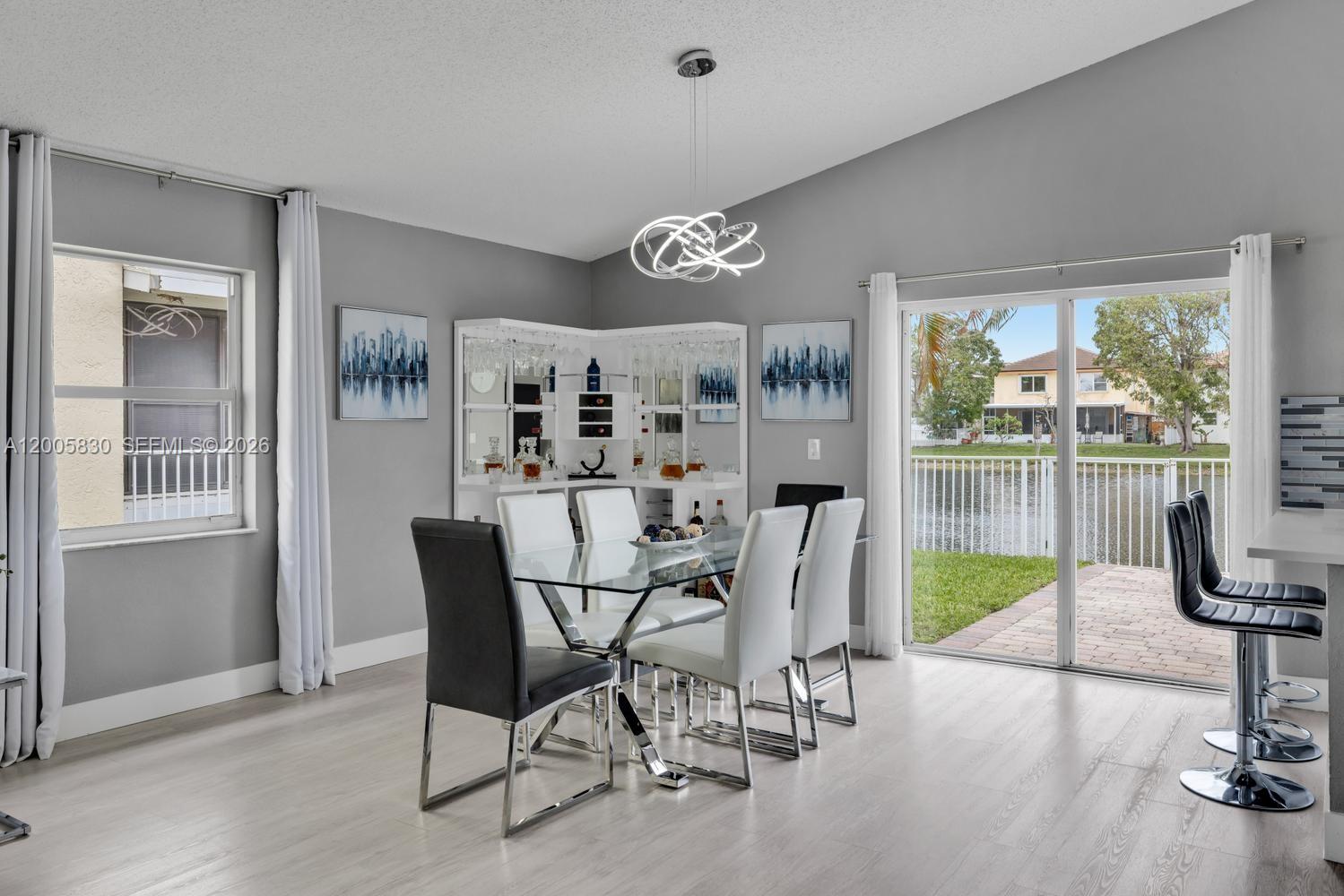 5861 South Sable Circle Margate, FL 33063 - Photo 6 of 56 a view of a dining room with furniture window and outside view