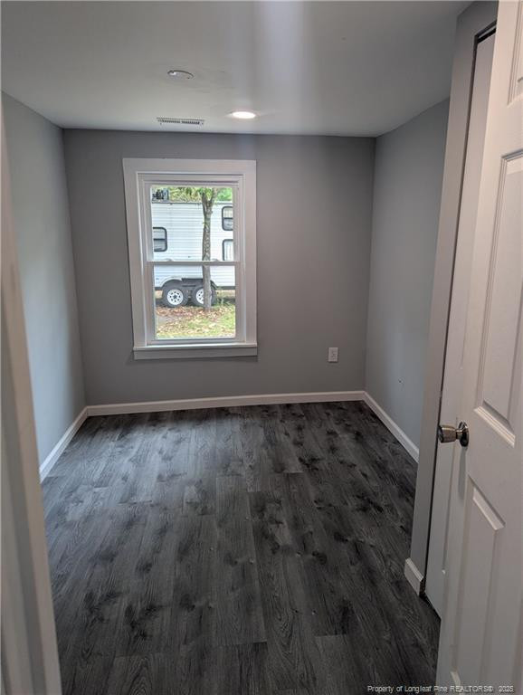 245 Maxie Loop Spring Lake, NC 28390 - Photo 6 of 10 an empty room with windows