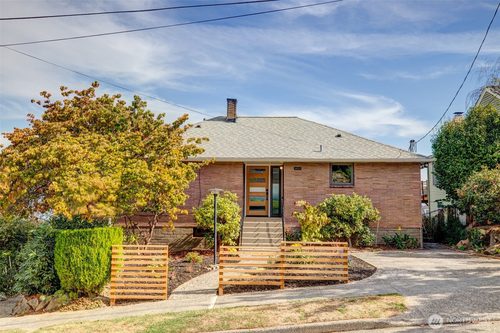 9804 63rd Avenue South Seattle, WA 98118 - Photo 2 of 40 a front view of a house