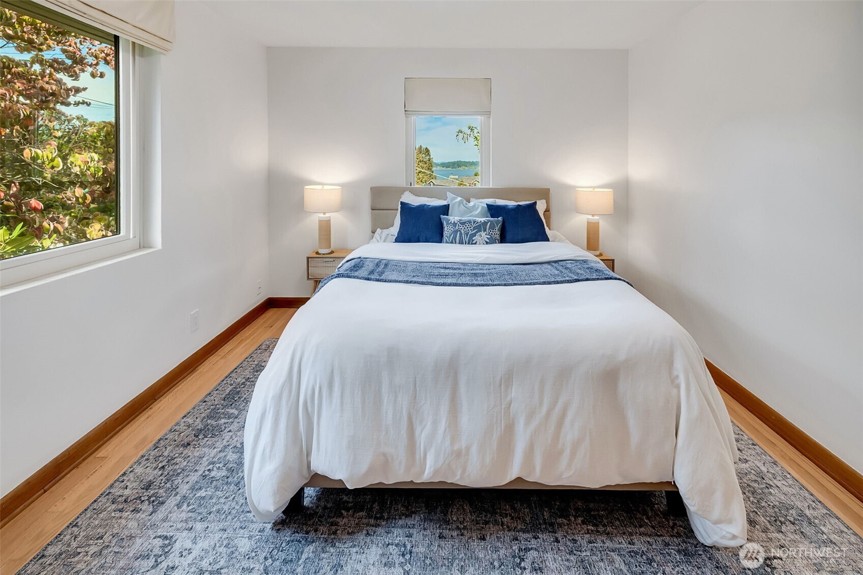 9804 63rd Avenue South Seattle, WA 98118 - Photo 26 of 40 a bedroom with a bed and a window