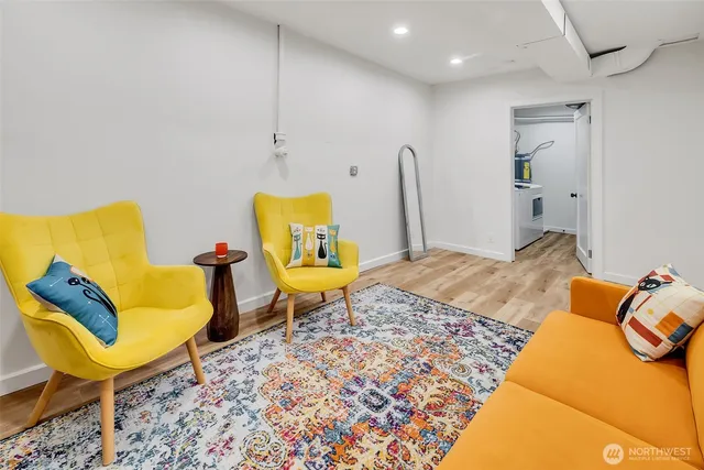 a bedroom with a bed and chair