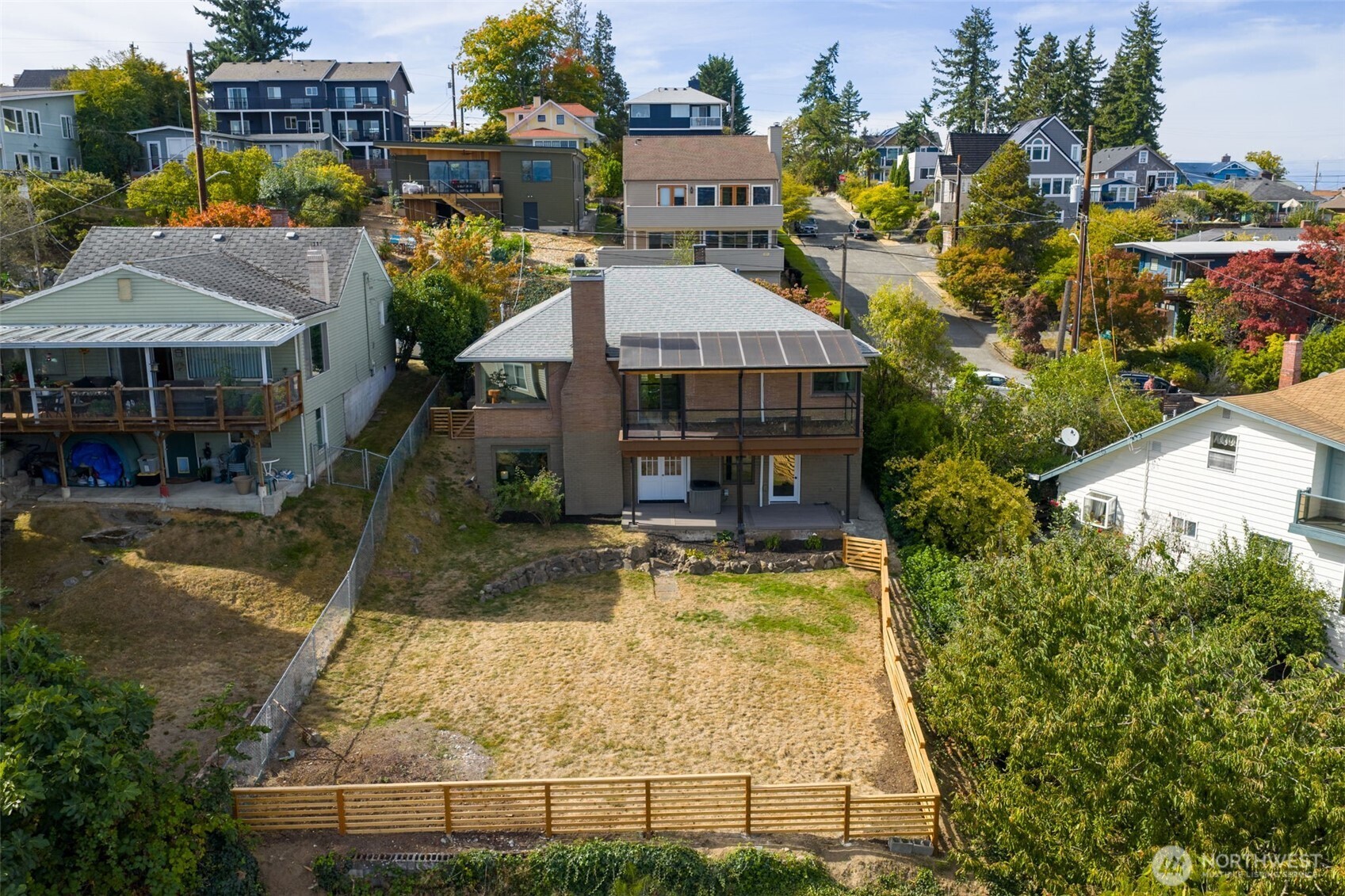 9804 63rd Avenue South Seattle, WA 98118 - Photo 40 of 40 a view of a house with a yard