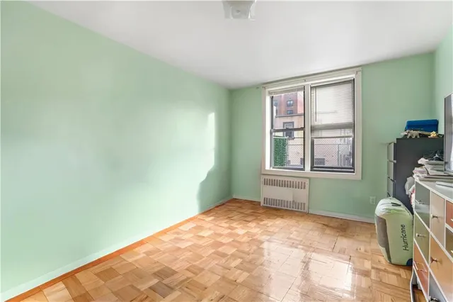 a room with window and a bed