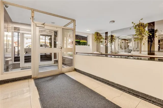 a view of a living room and entry way