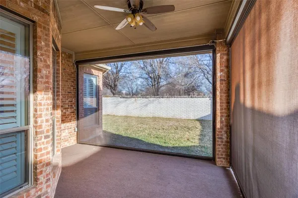 a view of a room with a large window